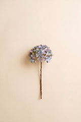 This faux floral stem showcases delicate blue and lavender-toned clustered blooms