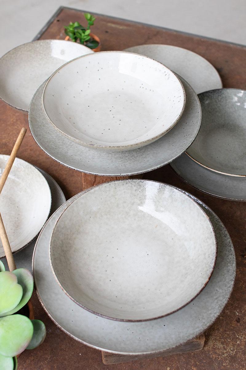 ceramic plate and bowl in oatmeal color on top of each other