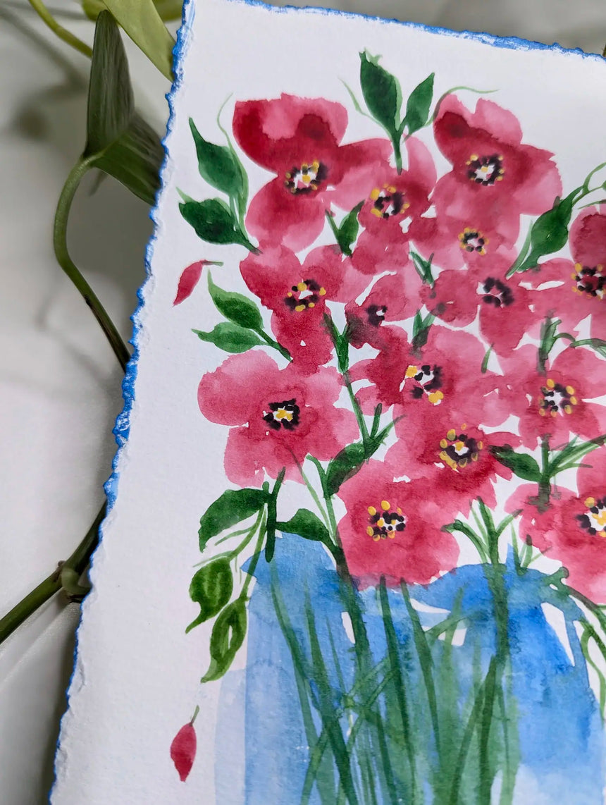 watercolor handpainted blue vase with red flowers on green stems - with plant background - zoomed in on flowers