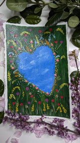 acrylic painting study of heart shaped pond amidst meadow of tulips and other flowers