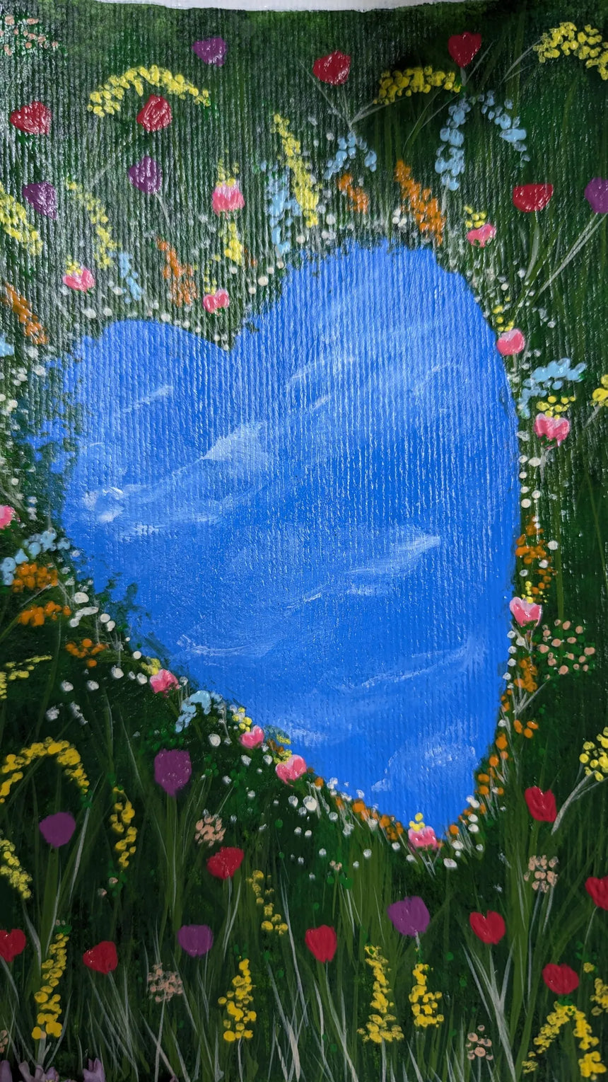 acrylic painting study of heart shaped pond amidst meadow of tulips and other flowers - close-up view