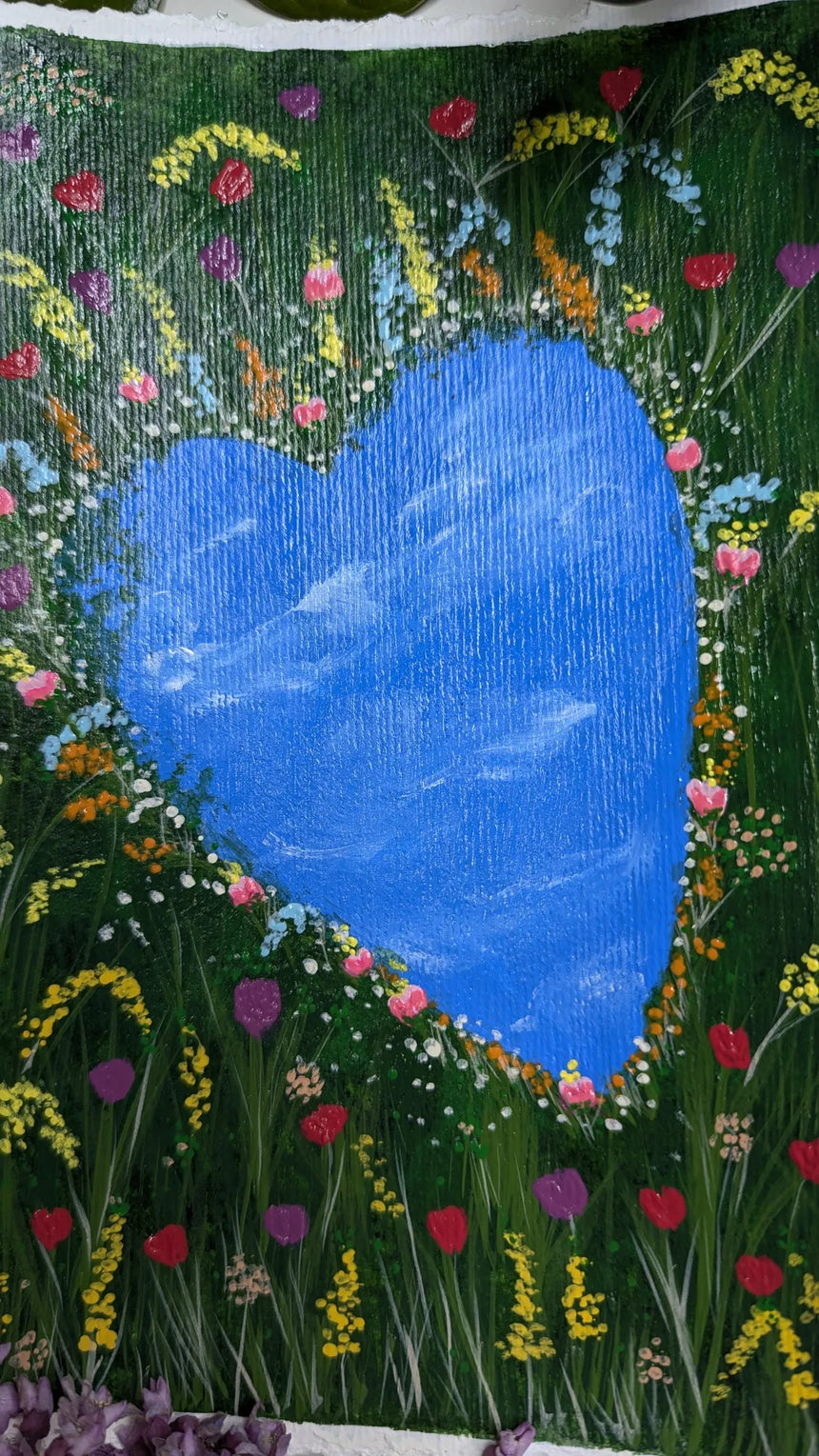 acrylic painting study of heart shaped pond amidst meadow of tulips and other flowers - mid close-up view