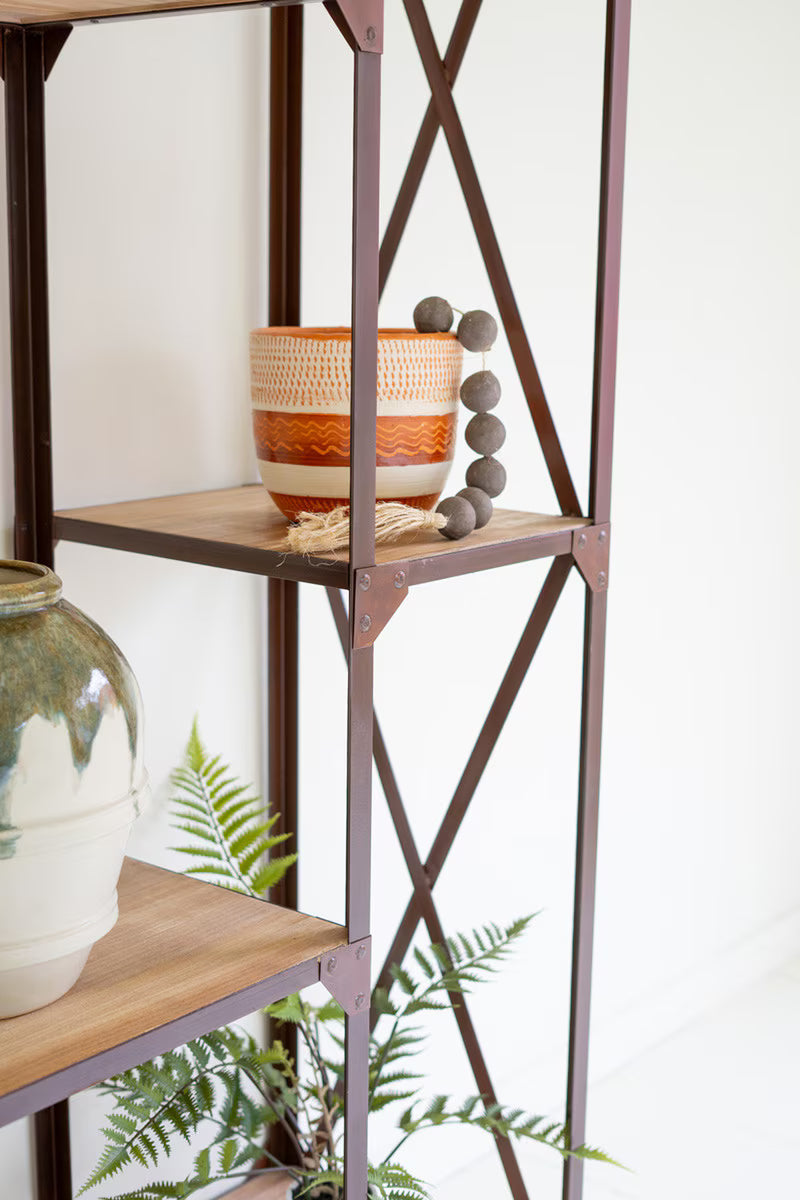 Decorative shelf with a vase, bowl and decorative ball on a white background