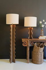 floor lamp made of mango wood with fabric shade - shown with matching desk lamp