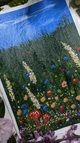 acrylic meadow painting study of wildflowers & mushrooms beneath blue sky - slanted left view