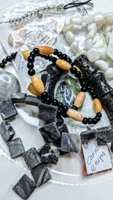 Redline Tear Drop, 2 Pendants, 8 Black Lava Rock Tubes, 15 Marble Light Green Beads, 20 Black Marble Beads, 30 Pebbles Tumbled beads - perspective 2