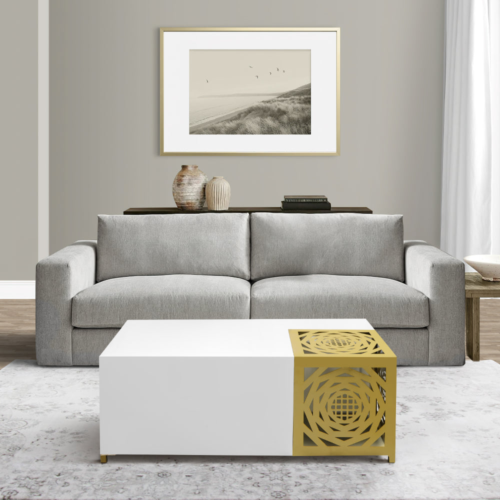 modern white rectangular coffee table with geometric cube detailed corner accent shown straight on in living room setting