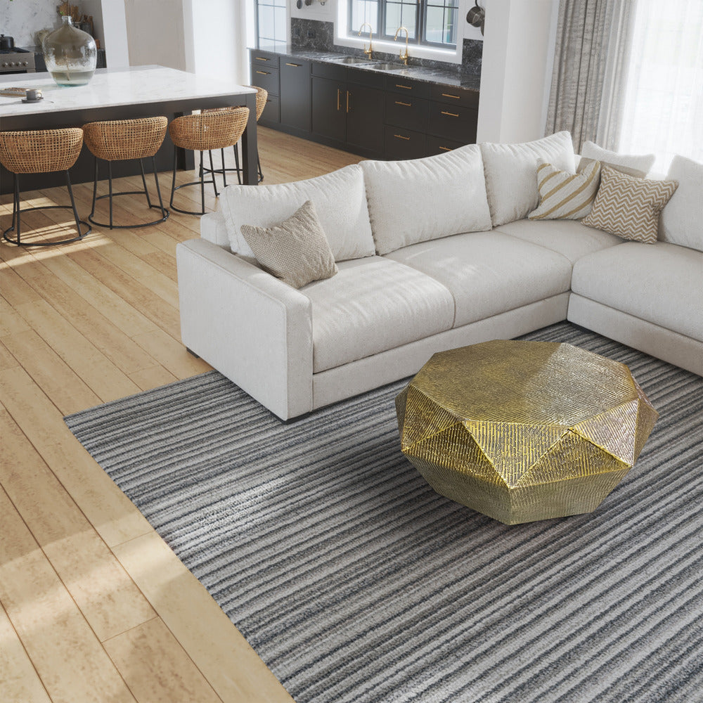 faceted octagonal coffee table - shown next to white sofa