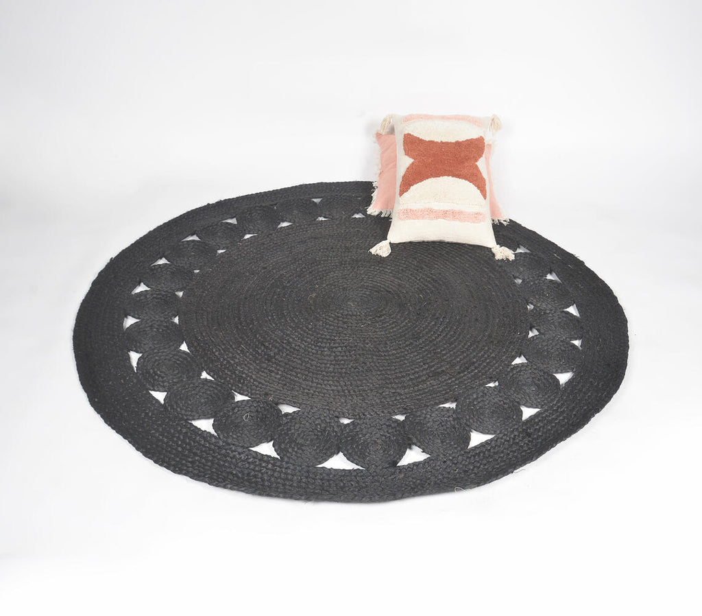 black handwoven round jute rug