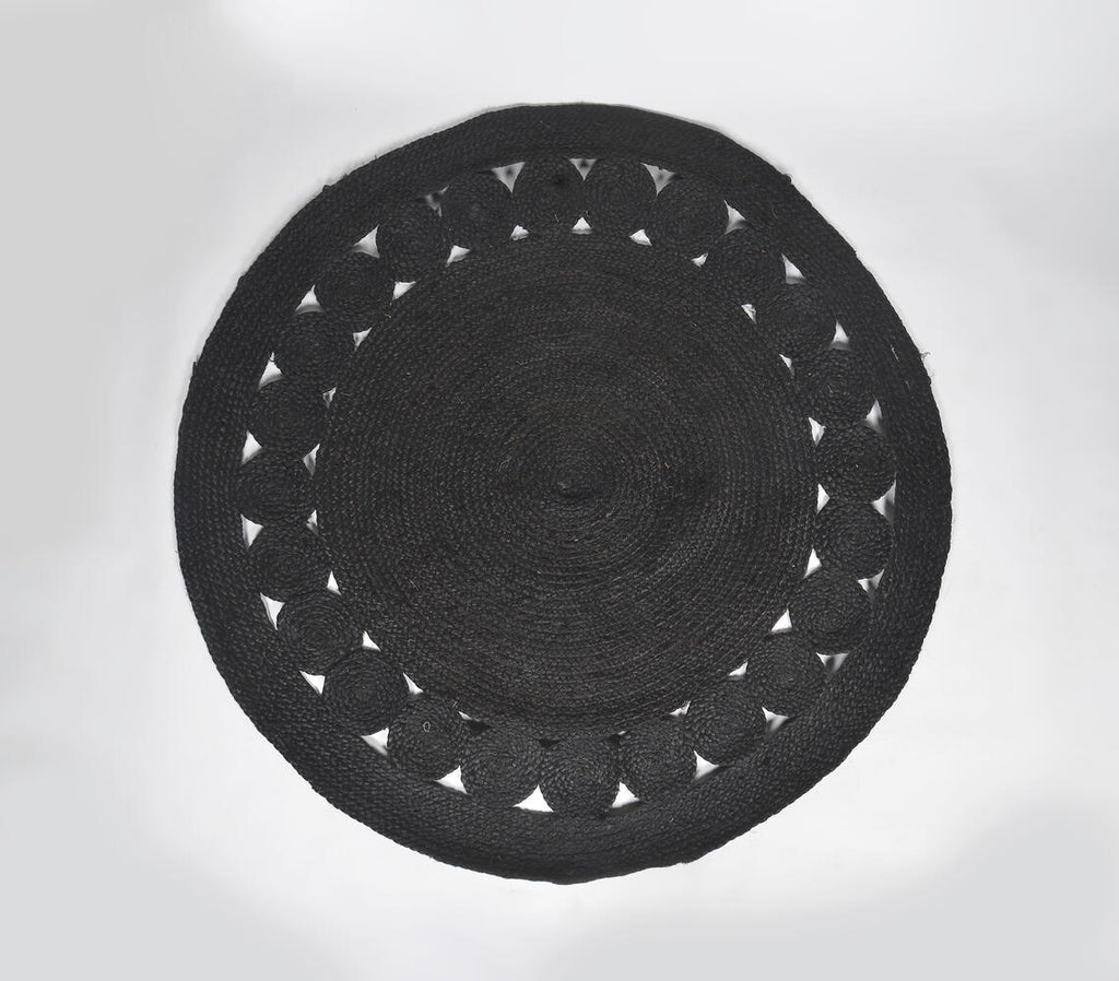 black handwoven round jute rug - top down view