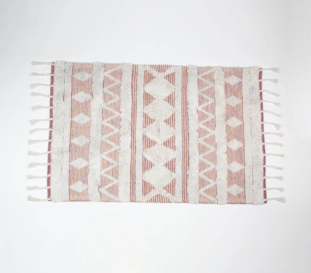pink and white tufted statement rug - top down view