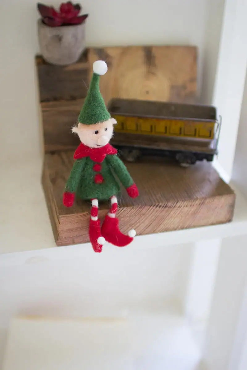 little felt elf dressed in green with green hat and red and white socks and shoes - shelf ornament