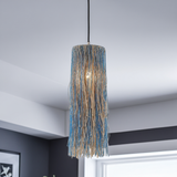 Bali blue glass bead pendant hanging in a room
