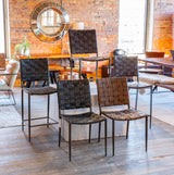 Lund buffalo leather dining chairs together