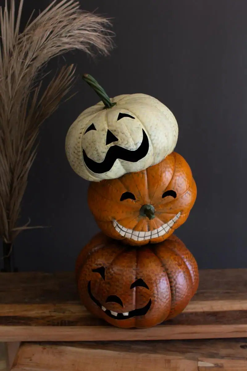 3 stacked jack-o-lanterns with different smiles and grins - halloween decor