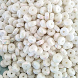 white acrylic drilled beads for jewelry making - close-up