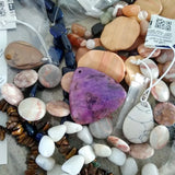 semi-precious stones on a strand labeled individually packaged