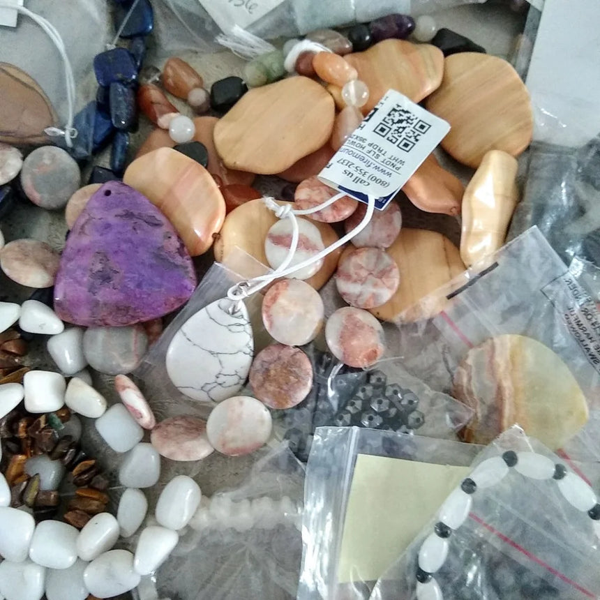 semi-precious stones on a strand labeled individually packaged