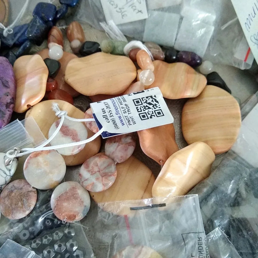 semi-precious stones on a strand labeled