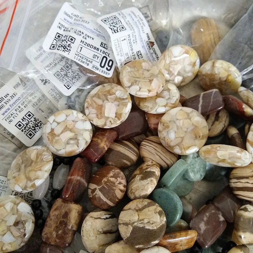 semi-precious stones on a strand labeled individually packaged