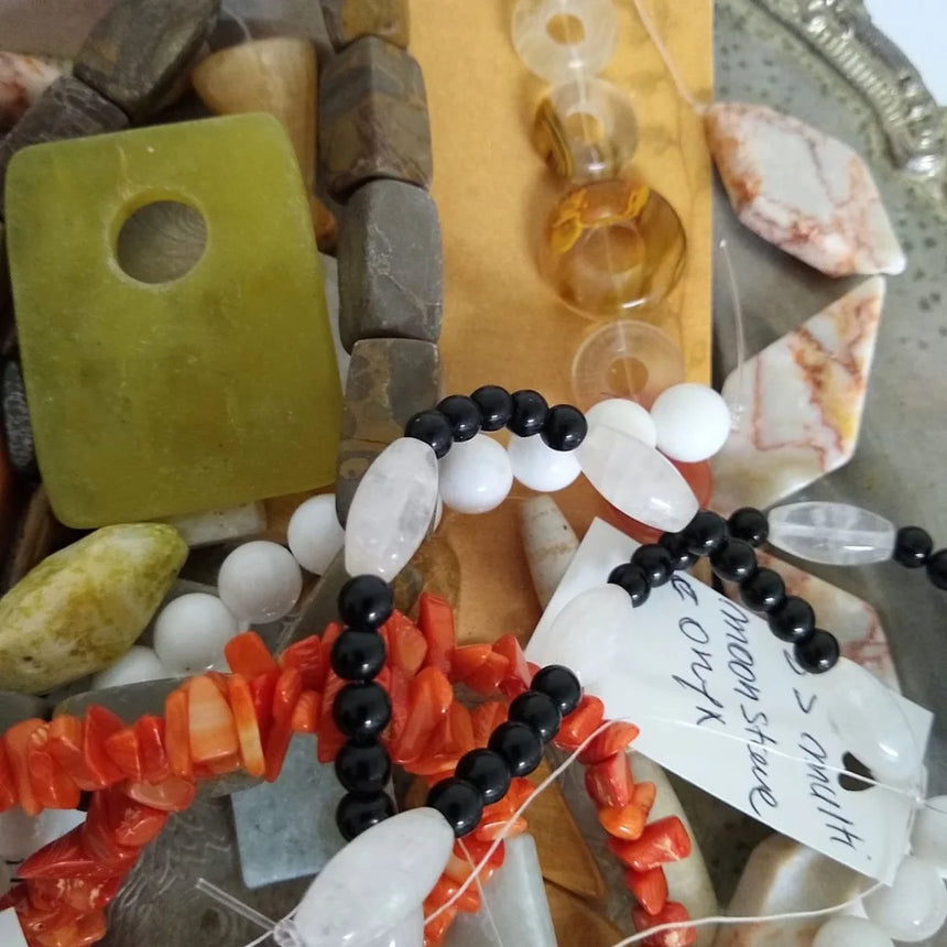 semi-precious stones on a strands red coral