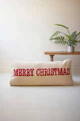 warm beige colored slim pillow with Merry Christmas message