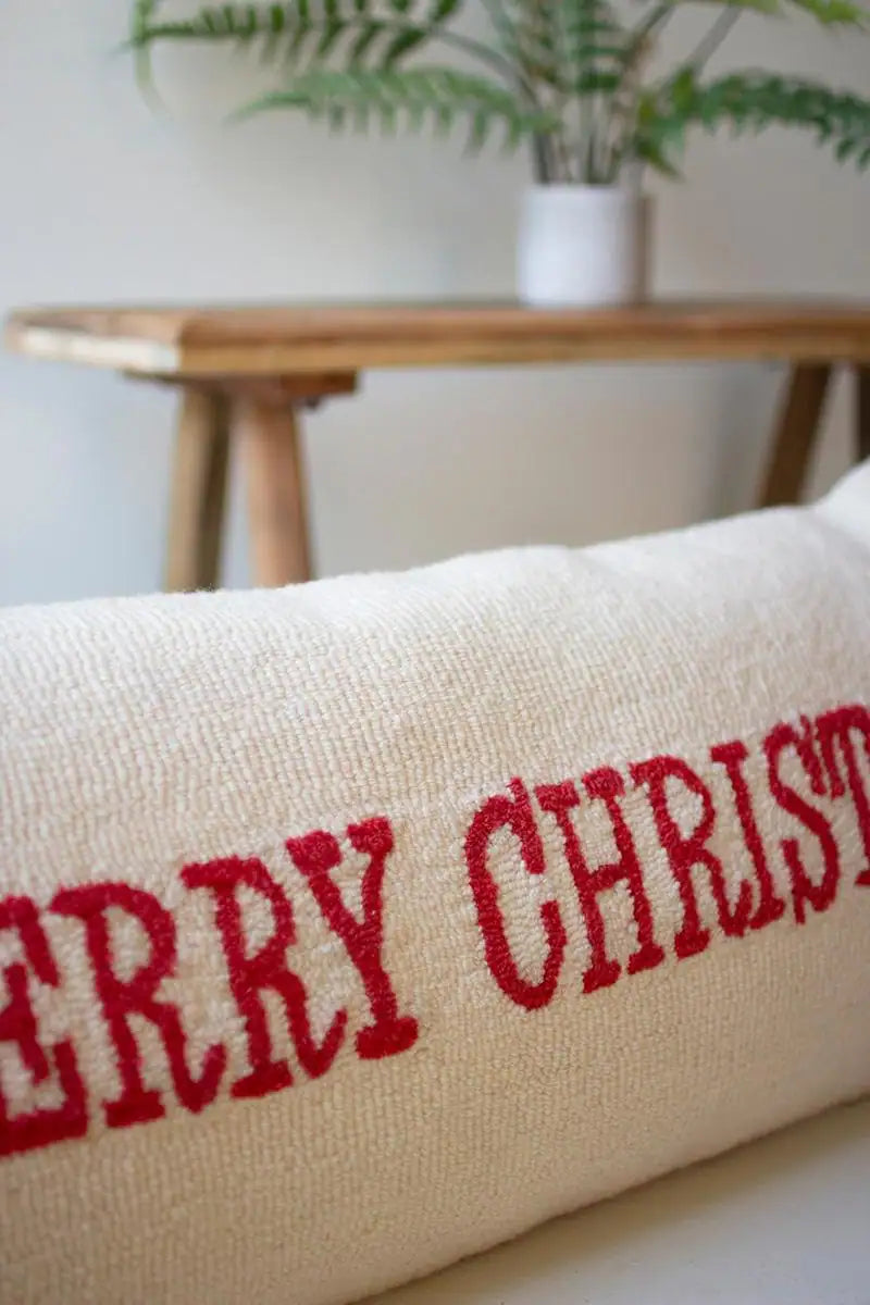 warm beige colored slim pillow with Merry Christmas message - close up