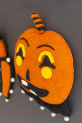 close up from left side of felt pumpkin wall hanging - halloween decor