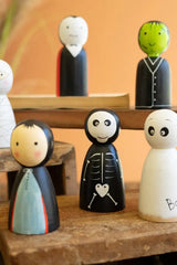 close up of the skeleton ghost and child figurines - halloween decor