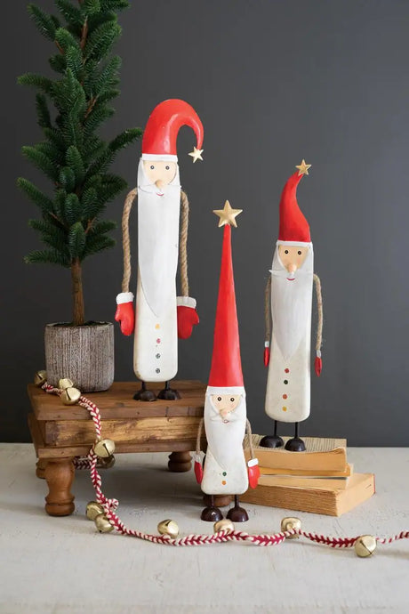 3 tall painted santas with rope arms