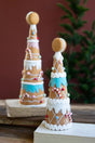 zoomed perspective of both felt gingerbread christmas trees