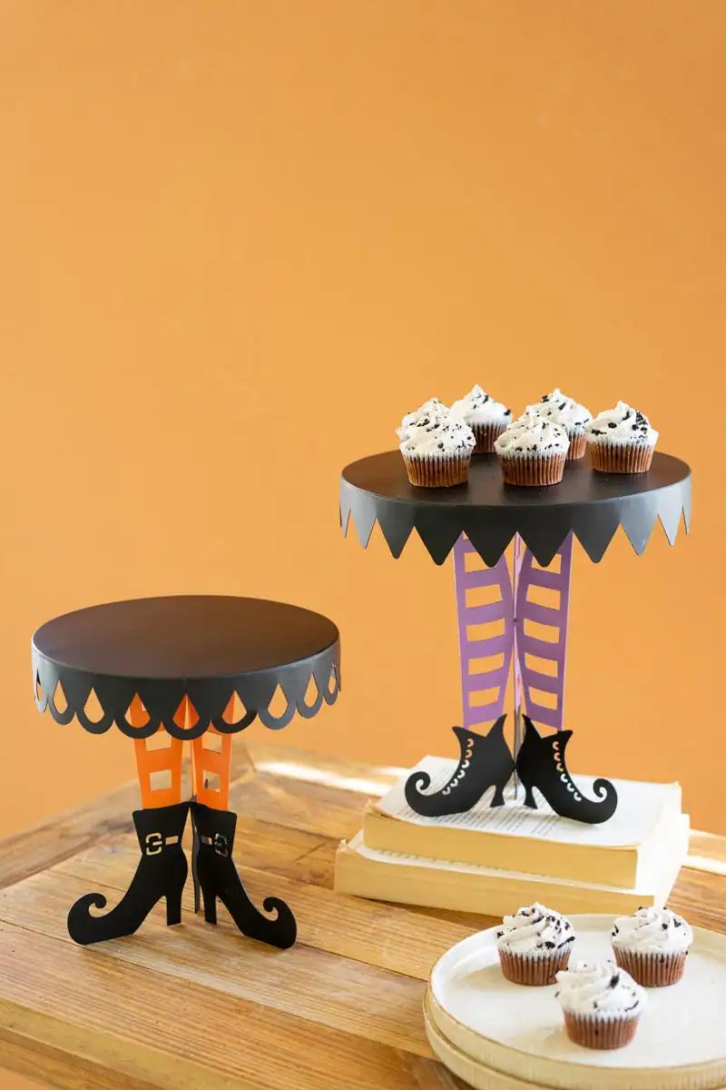 set of 2 black display stands with color witch legs and boots