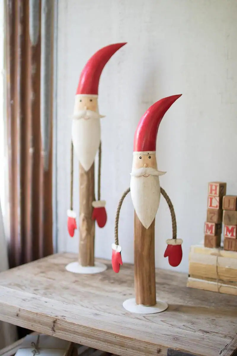 2 wood santas with anticipatingly friendly faces