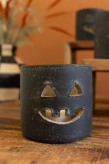 close up of black jack-o-lantern - halloween decor