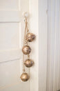 4 large rustic spherical brass bells on twine