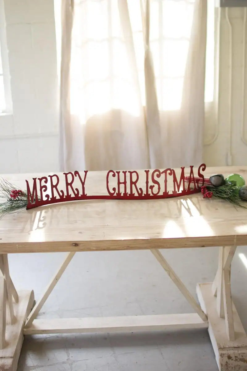 horizontal wavy tracked words merry christmas in red