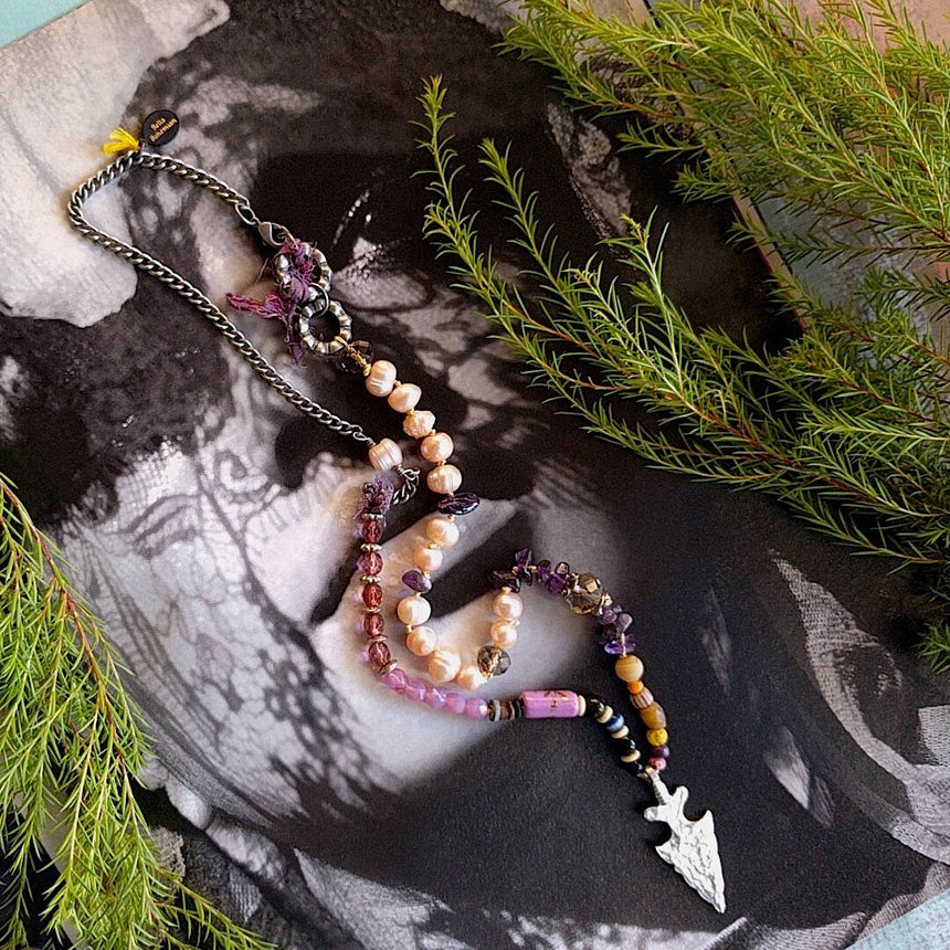 asymmetrical mixed media necklace, Swarovski rondelles, pink freshwater pearls on silk cord, dark amethyst chips