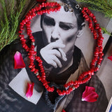 double strand coral necklace with lava heart on a waxed cord with Sterling silver Balinese beads