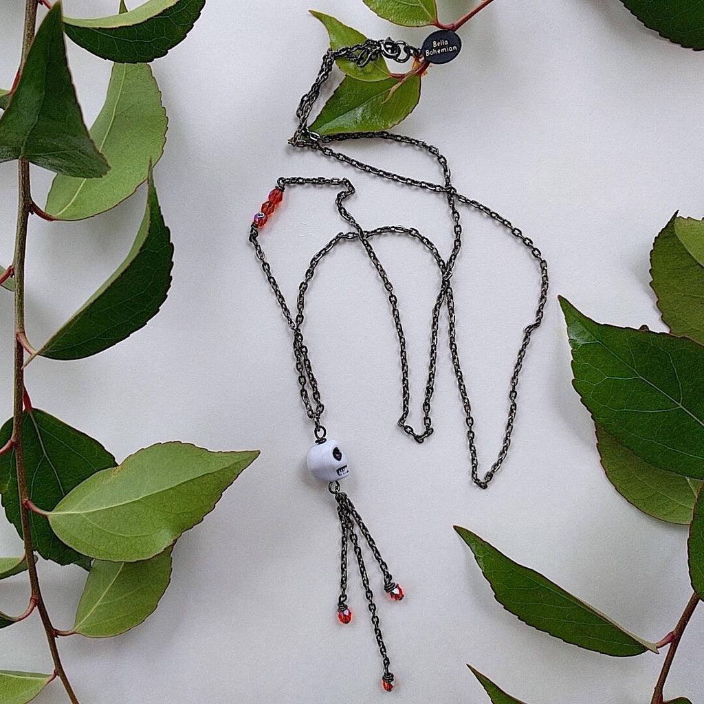 long bohemian gunmetal wire necklace with small skull pendant