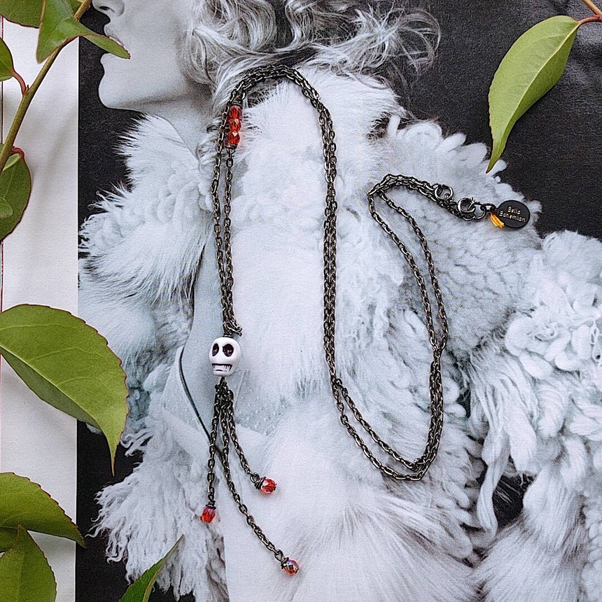 long bohemian gunmetal wire necklace with small skull pendant
