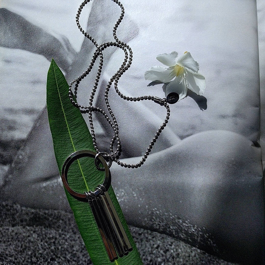 long ball chain necklace with circle tassel pendant