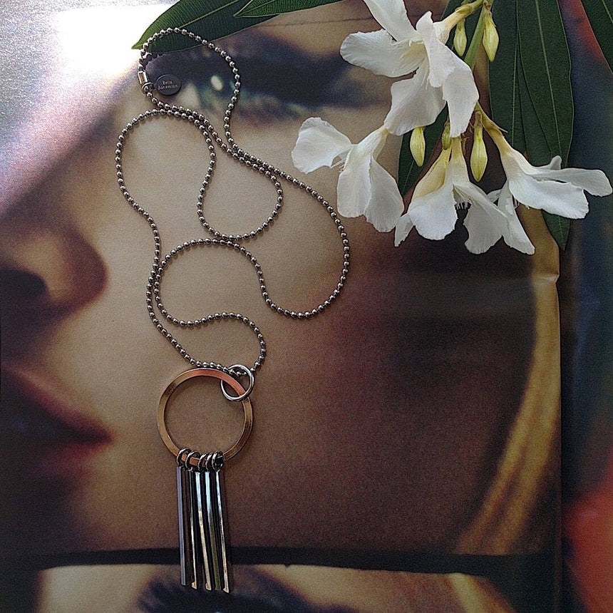 long ball chain necklace with circle tassel pendant
