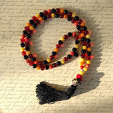 long bohemian bead necklace - letter background
