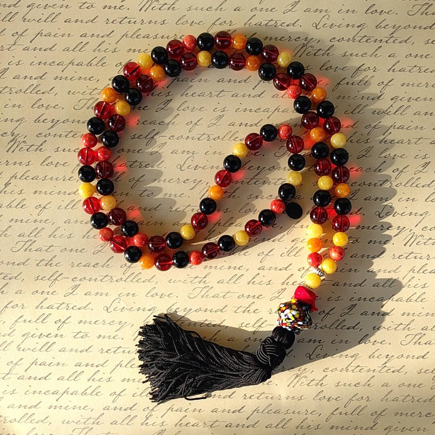 long bohemian bead necklace - letter background