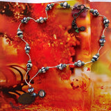 African and Tibetan beads necklace with carved donut shaped bones
