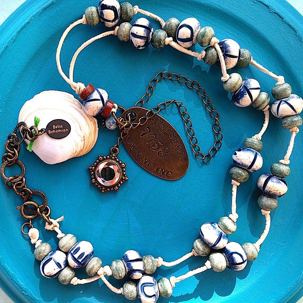 African and Tibetan beads necklace with carved donut shaped bones