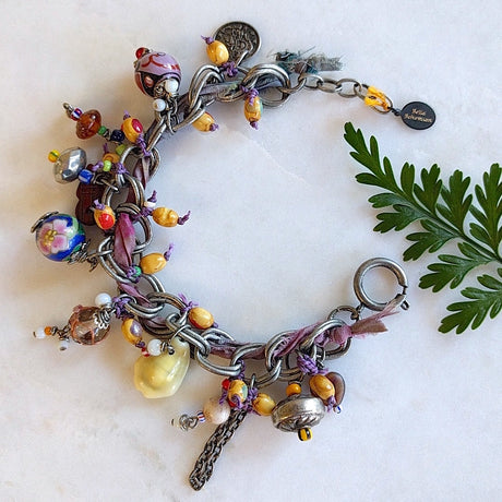 handmade bracelet with dyed dark and light purple sari silk