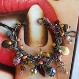 handmade bracelet with dyed dark and light purple sari silk on alternate background