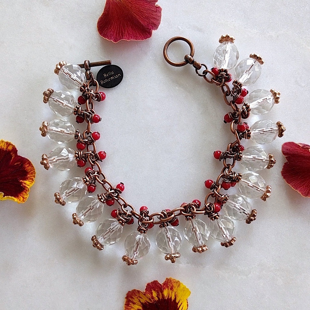 Copper charmed bracelet Boho chic with red corals and Swarovski crystals