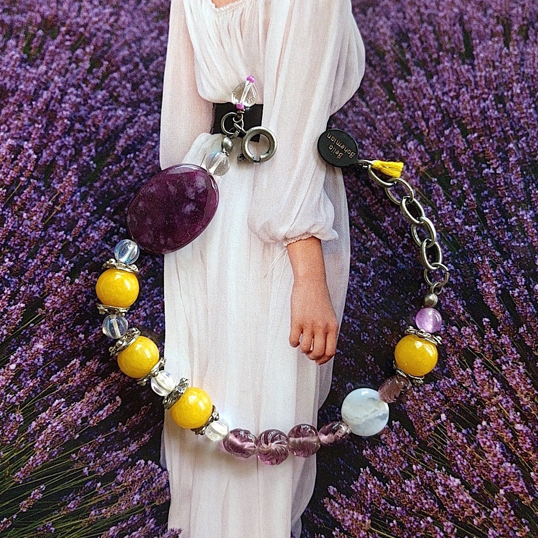 braclet with combination of yellow jade, purple glass beads, clear Czech glass beads